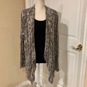 Dana Buchman, animal print, light weight wrap.  Rayon and spandex.  Sz Lg